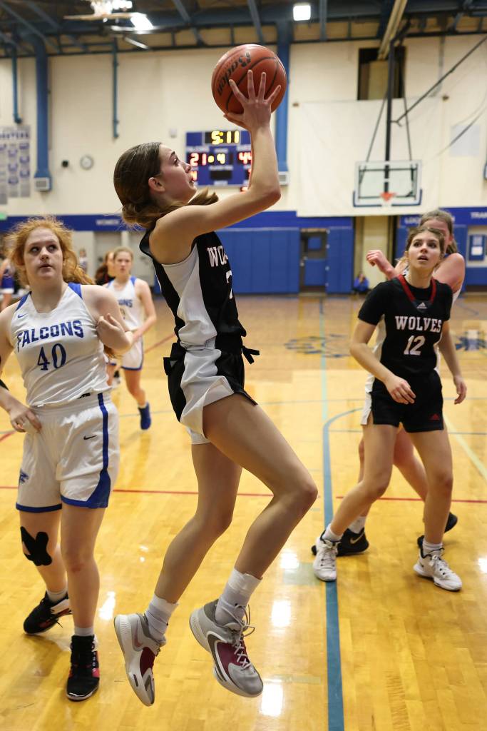 Photo by John Fisken
Coupeville athlete Lyla Stuurmans takes a shot at a Nov. 30 game against South Whidbey High School. Coupeville defeated South Whidbey 46-22.