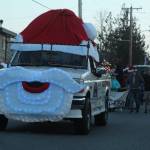 Photo by Karina Andrew/Whidbey News-Times
A truck decked out like St. Nick himself trundles down Main Street during the Greening of Coupeville.