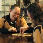 Photo by Karina Andrew/Whidbey News-Times
Kristi Uhles, left, plays one of the pouch games sold at TerraVen with partner Shea Looijen.