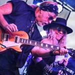 Photo by Dennis Browne
Joe Reggiatore is the guitarist for the T.Rust Band. He and Janie Cribbs are partners in life and in music.