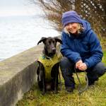 Elizabeth Johnson with rescue dog Pretzel. Her upcoming library talk focuses on understanding your own furry, four-legged friend better. (Photo by David Welton)