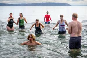 Photo by David Welton
People of all ages rang in the new year by taking an icy dip in the waters of Double Bluff Beach in Freeland on New Years Day. A total of 158 participants registered for the annual Polar Bear Dive event, from the ages of 4 to 79.