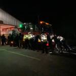 Photo provided
North Whidbey Fire and Rescue firefighters push one of two new engines into its new home at Station 25.