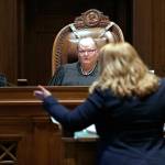 Justice Charles Johnson, then-Chief Justice Mary Fairhurst (center) and Justice Barbara Madsen listen as Michele Earl-Hubbard, an attorney for a media coalition led by the Associated Press, speaks during a hearing before the Washington Supreme Court in Olympia, in June, 2019, regarding a case to determine whether state lawmakers are subject to the same disclosure rules that apply to other elected officials under the voter-approved Public Records Act. The Washington Supreme Court ruled Thursday, Dec. 19, 2019, that the Public Records Act does fully apply to state lawmakers in a 7-2 decision. (Elaine Thompson / Associated Press)