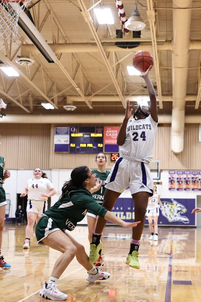 Photo by John Fisken
Oak Harbor athlete Suki Warden take a jump shot at a Jan. 13 game against Mount Vernon. The Oak Harbor girls varsity team defeated Mount Vernon 50-49. The team is now 7-5 overall this season.