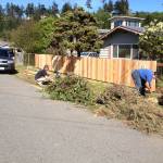 Photo provided
Central Whidbey Hearts and Hammers volunteers do yard work during last years work day.