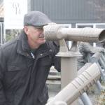Photo by Kira Erickson/South Whidbey Record
Callahan McVay peers through a telescope on First Street in Langley. During the pandemic, the Langley Main Street Association installed the telescopes, which make for great whale-watching opportunities.