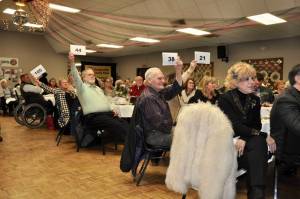 Photo provided
Attendees bid at a previous Coupeville Lions Club scholarship auction.