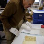 Photo by David Welton
South Whidbey Historical Society President William Haroldson handles Joseph Whidbeys original will with cotton gloves.