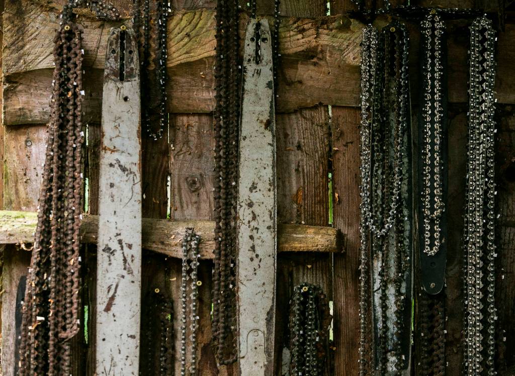 Chains hang in the workshop. (Olivia Vanni / The Herald)