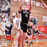 Coupeville sophomore Katie Marti takes a shot in a game against La Conner Wednesday. Coupeville hosted the bi-district tournament this week. The girls beat Auburn Adventist Academy 39-29 Monday, then lost 59-35 to La Conner Wednesday in the title game. The Wolves closed the season with a 10-11 record. (Photo by John Fisken)
