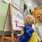 Photo provided
Sage, 17 months, paints a picture at Playscape while her mom, Megan Ostermick-Durkee, looks on.