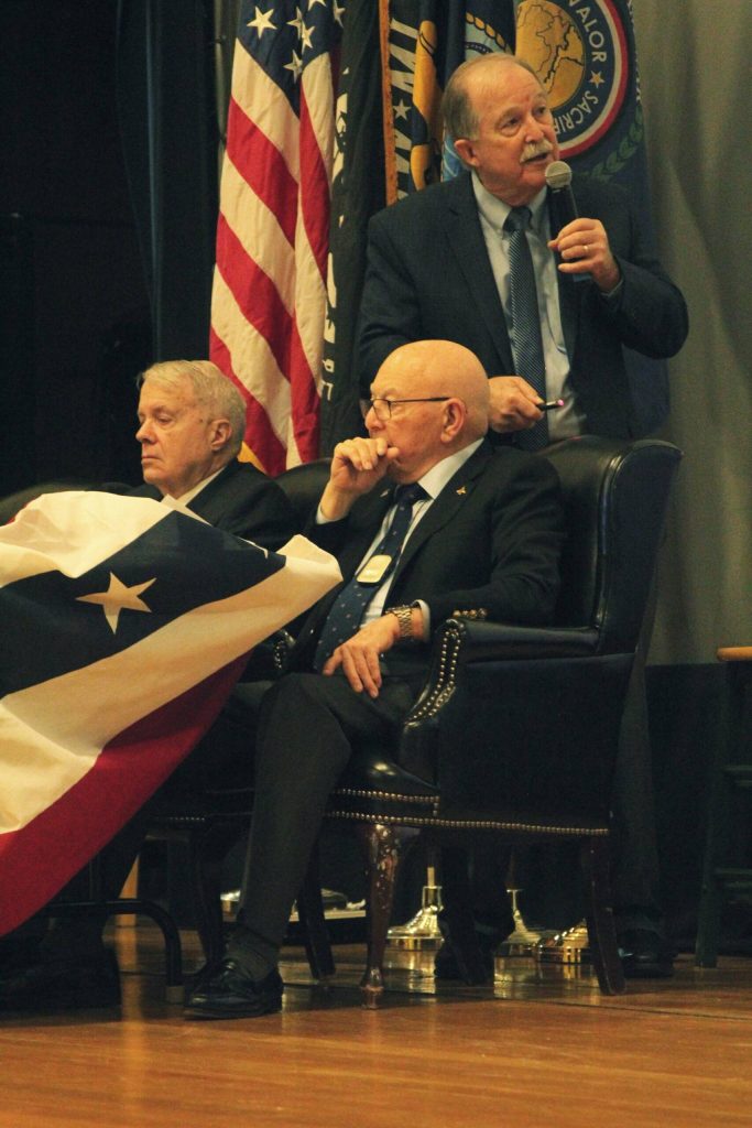 Photo by Karina Andrew/Whidbey News-Times
Bill Reeder, standing, Bill Wilson, left, and Joe Crecca share their experiences as prisoners of war in the Vietnam War at a symposium at Naval Air Station Whidbey Island March 16.
