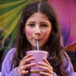 Photo by David Welton
Willow Skaggs, 7, enjoys a drink from TONIC Juice & Remedy, a new business in downtown Langley.