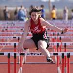 Photo by John Fisken
Freshman Liza Zustiak runs in a hurdle event March 22 during Coupeville High School's first home track and field meet of the season. Zustiak competed in the 100 meter hurdles and 300 meter hurdles, winning 9th place in both events and earning a personal record of 23.56 seconds in the 100 meter hurdles race.