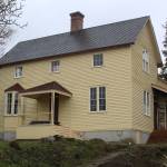 The Haller House is primed for its final paint job, which will be brown and tan. (Photo by Karina Andrew/Whidbey News-Times)