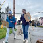 Students and community activists rally in Coupeville March 24 to voice their support for a county climate emergency declaration. (Photo provided)