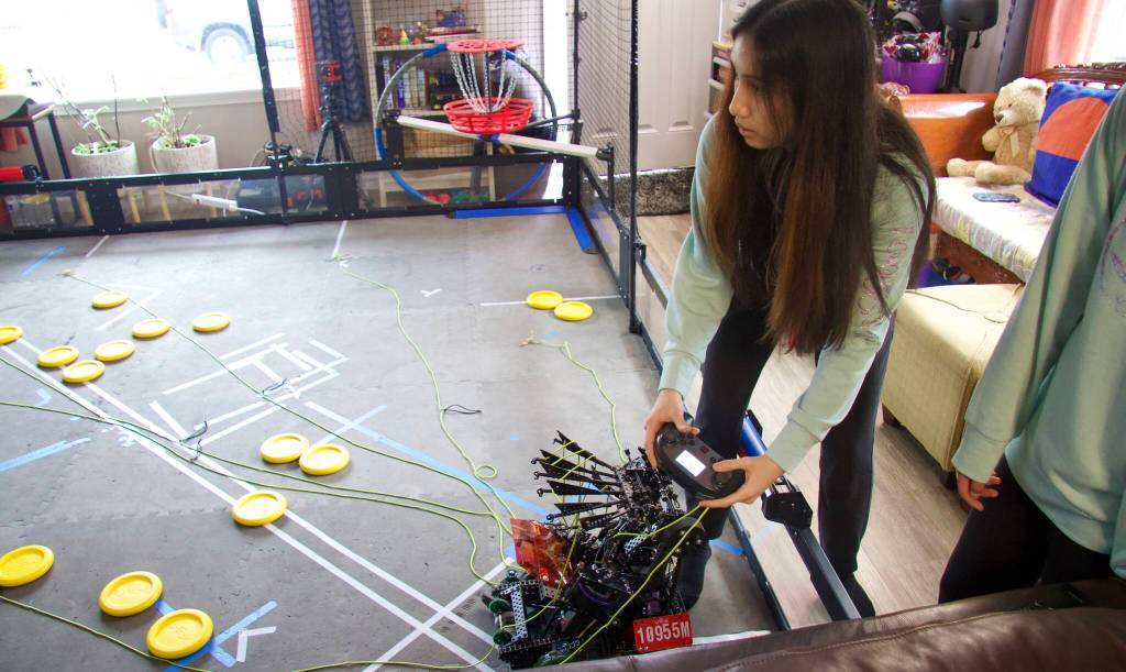 Photo by Rachel Rosen/Whidbey News-Times
Mikayla Serrantes controls the robot the she and her siblings built.