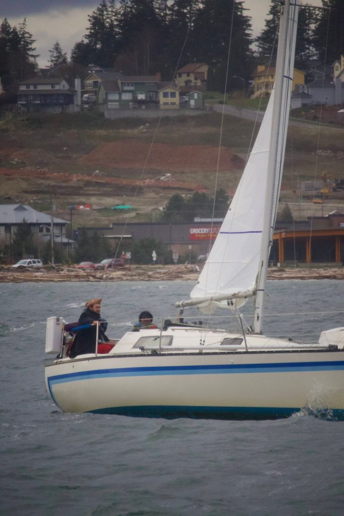 A boat participates in the Oak Harbor Yacht Clubs Frostbite Series sailboat race. (Photo by Rachel Rosen/Whidbey News-Times)