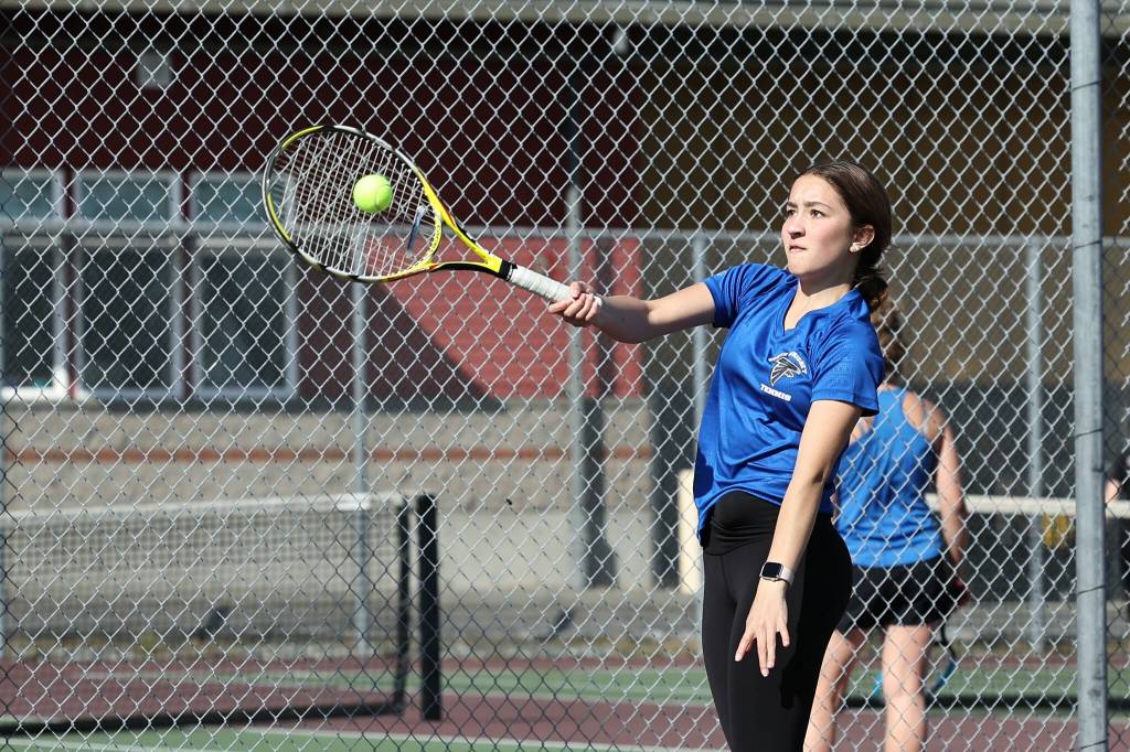 Photo by John Fisken
Junior Mikaela Nelson played 1st doubles with fellow junior Pearl Buck and won 6-2, 6-1.