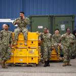 Photos by David Welton
Ground crew await the return of VAQ-140 on base Saturday afternoon.