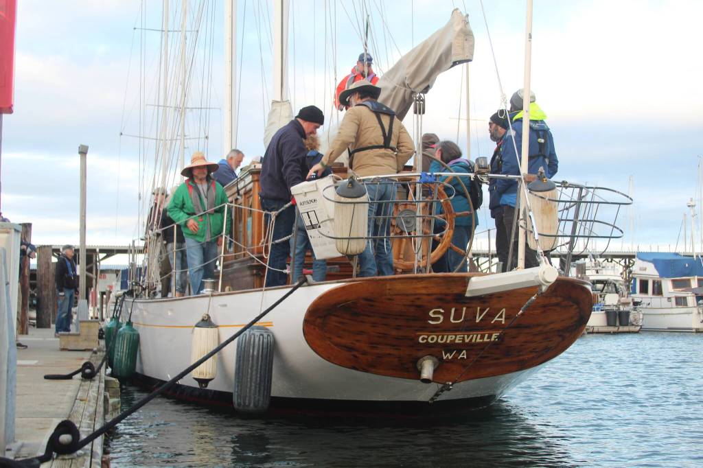 Volunteer crew members practice their various duties during a training sail on the Suva April 24. (Photo by Karina Andrew/Whidbey News-Times)