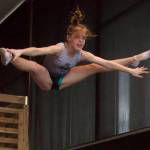 Malaina Yargo, 14, straddle jumps on a trampoline. Yargo is a national qualifier in double mini. (Photo by Rachel Rosen/Whidbey News-Times)