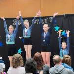 The Island Flyers took home several awards at last weekends state championships. From left, Sutton Zimmerman, Louri Sorensen, Katrin Kurganov and Gratia Riippa. (Photo provided)
