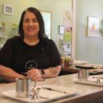 Photo by Karina Andrew/Whidbey News-Times
Megan Varner-Duckett operates the new candle bar at Varner Candle Company, where guests can pour their own candles.