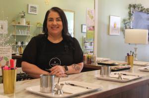 Photo by Karina Andrew/Whidbey News-Times
Megan Varner-Duckett operates the new candle bar at Varner Candle Company, where guests can pour their own candles.