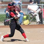 Photo by John Fisken
Haylee Armstrong, an eighth grader and starter on Coupeville High Schools varsity softball team, swings during a game against La Conner April 29. The Wolves won 17-2.