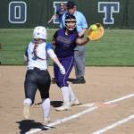 Oak Harbor athlete Loto Tupu catches the ball at a softball game against Sedro-Woolley May 9. The Wildcats defeated Sedro-Woolley 6-3. (Photo by John Fisken)