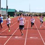 From left, Coupeville Middle School seventh graders Roger Merino-Martinez, Beckett Green, Leo Rodriguez, Carson Grove and Wyatt Fitch-Marron race at a track meet Wednesday. (Photo by John Fisken)