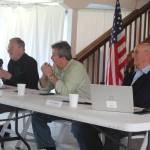 From left, port commissioners John Mishasek, David Day and John Callahan host a public hearing regarding the ports purchase of the A.J. Eisenberg Airport. (Photo by Karina Andrew/Whidbey News-Times)