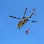 Photo by Karina Andrew/Whidbey News-Times
An NAS Whidbey Island Search and Rescue helicopter executes a flyover at the conclusion of the Service of Remembrance on Memorial Day.