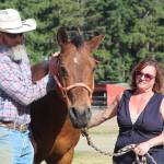 Photo by Karina Andrew/Whidbey News-Times
Doug and Alexis Mills stand with Django.