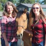 Jaimie Sawyer, left, and Shannon Ivins stand with Apache.