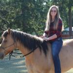 Photo by Karina Andrew/Whidbey News-Times
Shannon Ivins rides her horse, Apache.