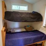 Bunk beds save space in the tiny houses.