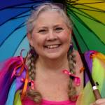 Vivian Rogers Decker walks in Coupevilles first pride parade June 17. (Photo by David Welton)