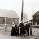 From left, Sarah Ellen Grubb, Delta Pearl Grubb Delong, James Leslie Delong, Frank L. Delong, Ester Delong and Jesse L. Delong in front of the Little Brown Church and the original house on the property in 1916. (Photo provided)