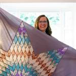 A quilter, Emily Grubb can make a blanket representing the couples colors for their wedding. (Photo by David Welton)