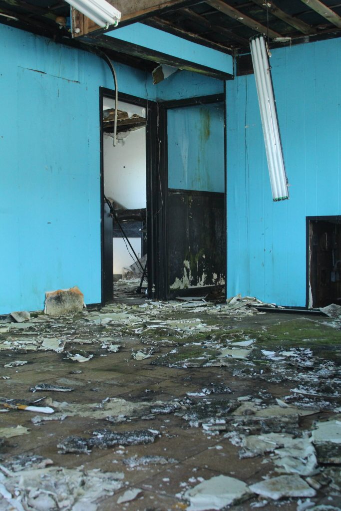 The interior of a building the city recently purchased on Pioneer Way is hazardous after years of neglect. (Photo by Karina Andrew/Whidbey News-Times)