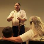 Louis LaBombard speaks during a storytelling event at the library. (Photo by Luisa Loi/Whidbey News-Times)