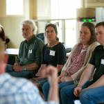 Representatives from different government organizations listen to a Harrington Lagoon resident speak about PFAS found in their drinking water during a public forum on June 22, 2023, at the Coupeville Recreation Hall in Coupeville, Washington. From left are Claire Nitsche of the Department of Health, DOH Regional Manager Derek Pell, DOH toxicologist Barbara Morrissey, Department of Ecologys Kim Wooten and Island County hydrogeologist Chris Kelley. (Ryan Berry / The Herald)