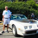 Barry Tesch poses in front of his 1980 Pontiac, a pace car for the Indy 500. (Photo by Luisa Loi)