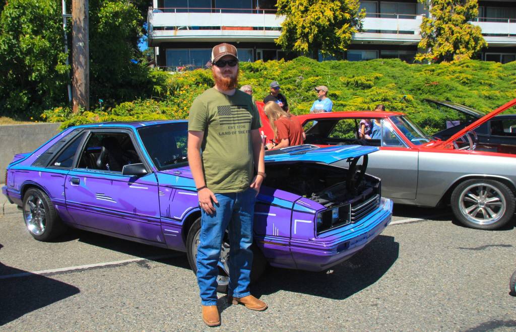 Gary Cooney poses in front of his 1979 Mercury Capri inspired by comic art. (Photo by Luisa Loi)
