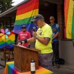 Jeff Natter introduced the speakers at Saturdays Pride event in Langley, which included Wolfgang Nyland, left, and Mayor Scott Chaplin. (Photo by David Welton)