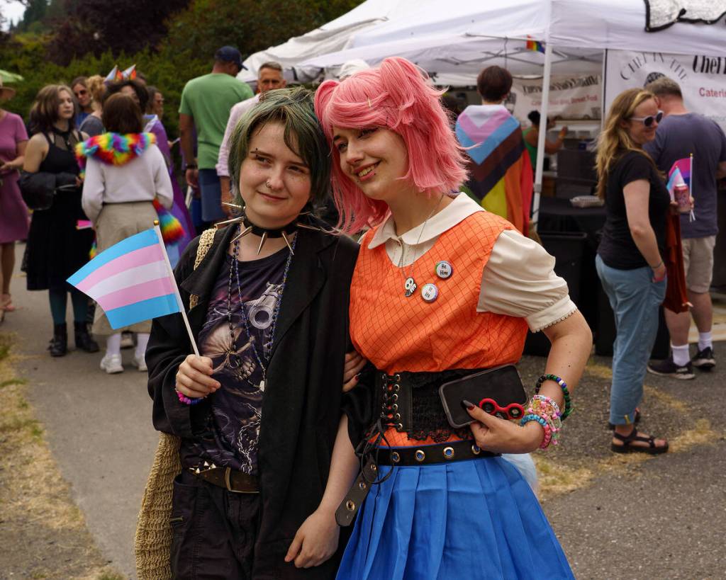 Two young people celebrate at the Langley Pride event. (Photo by David Welton)