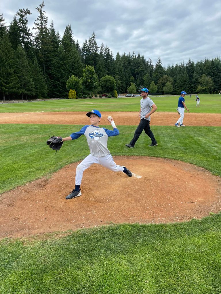 Wyatt Bishop warms up on the mound during practice on July 10. (Photo provided)